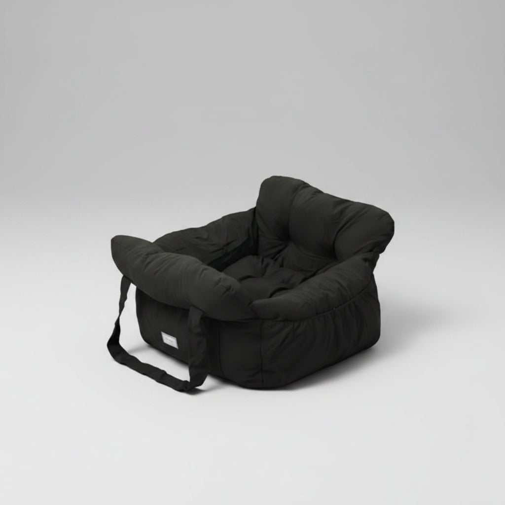 Black puffer seat cushion on a white surface