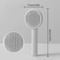 Wooofly self-cleaning deshedding brush in grey showing the 7.5cm cleaning head